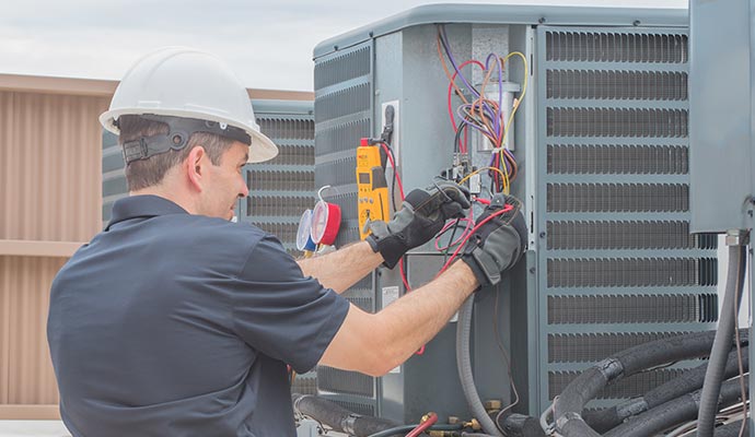 Professional worker repairing your AC