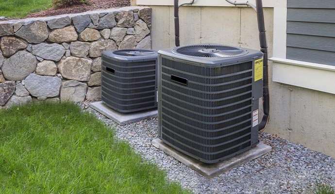 professionals providing air conditioning services for maintenance and repair.