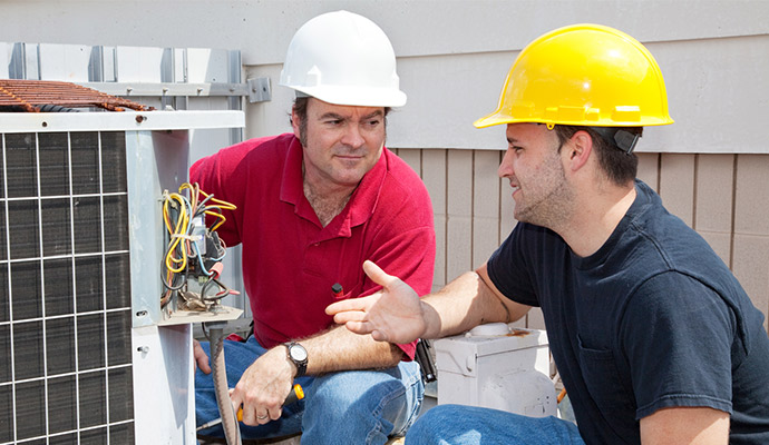 AC Contractors Discussing