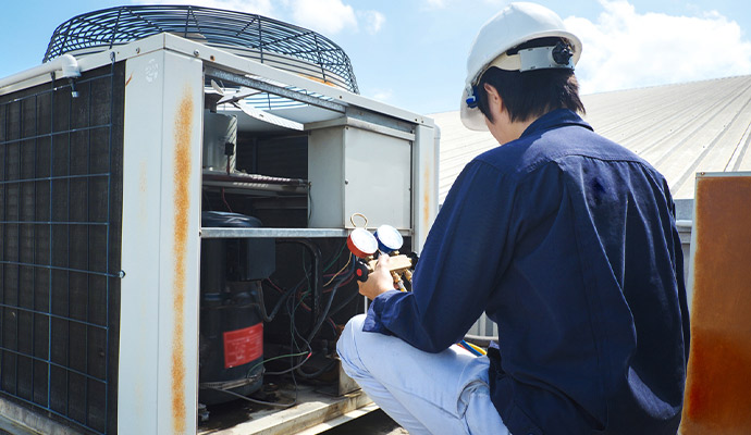 Reliable Repairman Fixing AC