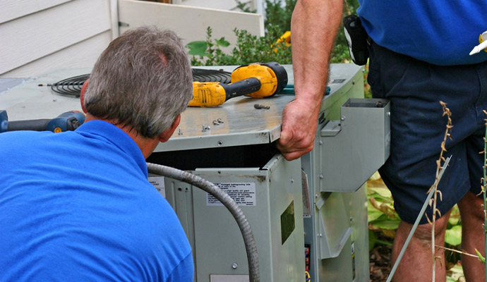 Service Men Repairing AC