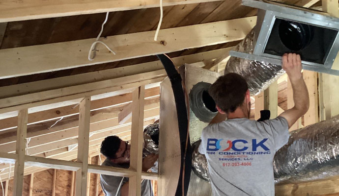 Bock Air Conditioning Services professional is replacing duct