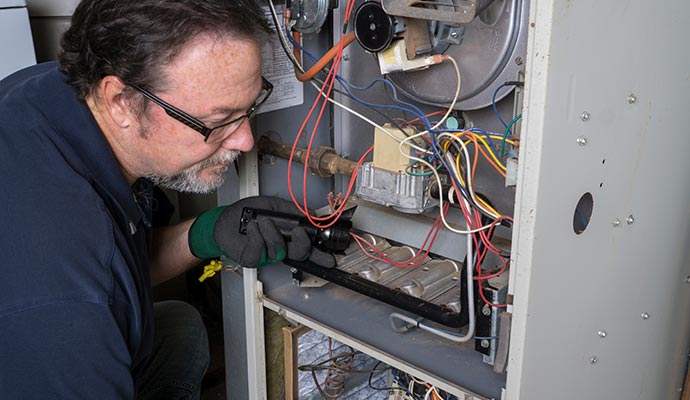 Expert inspecting Furnace