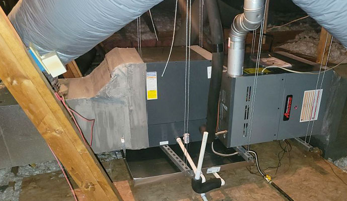 Air handler and ductwork installed in a home attic