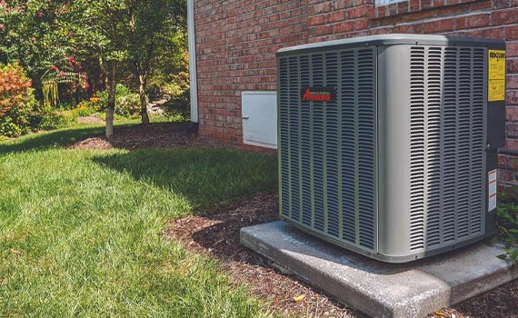 clean heating pump outside the house