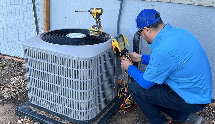 Professional inspecting heating system