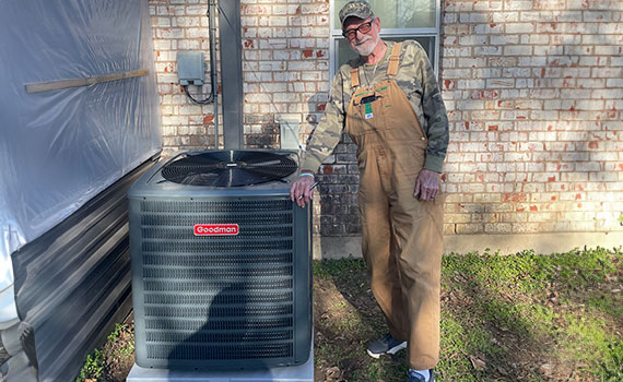 technician installing heating system