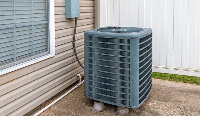  a residential HVAC system, essential for heating, ventilation, and air conditioning within a home.