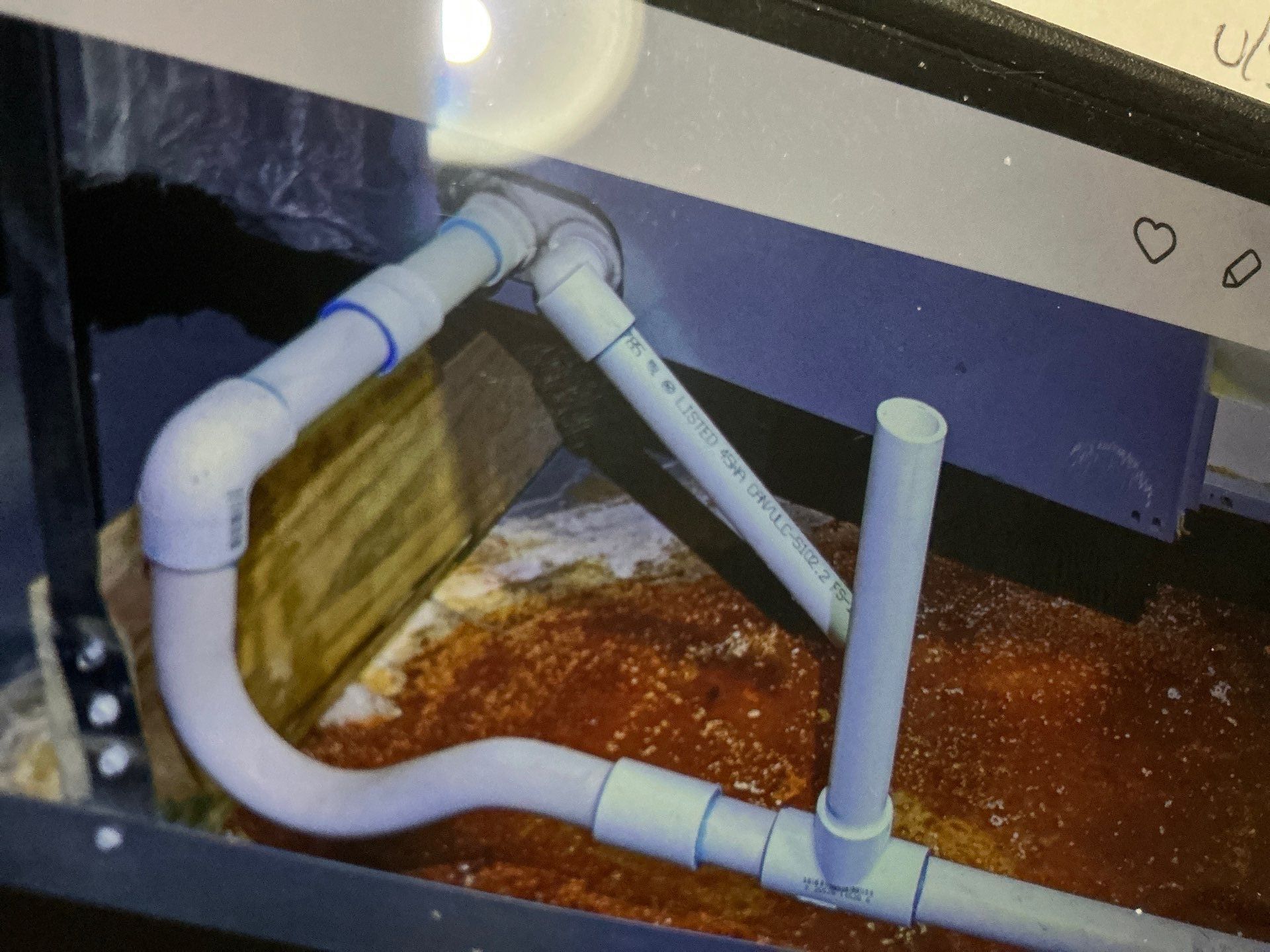 Rust on drain pan from clogged drain.