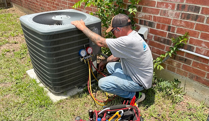 Professional outdoor AC unit maintenance and system check
