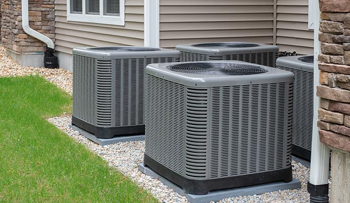 professionals providing air conditioning services for maintenance and repair.