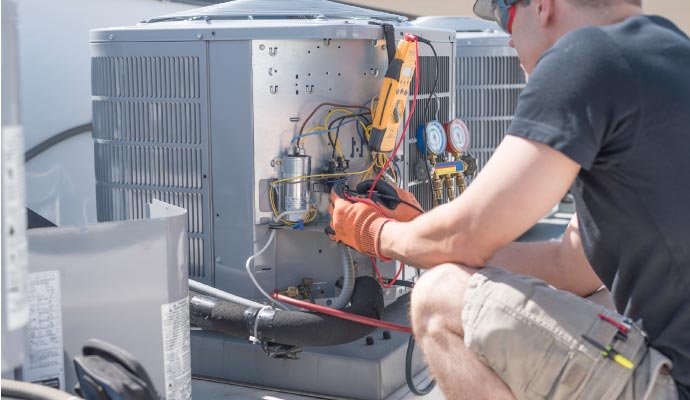 An expert repairing heating system