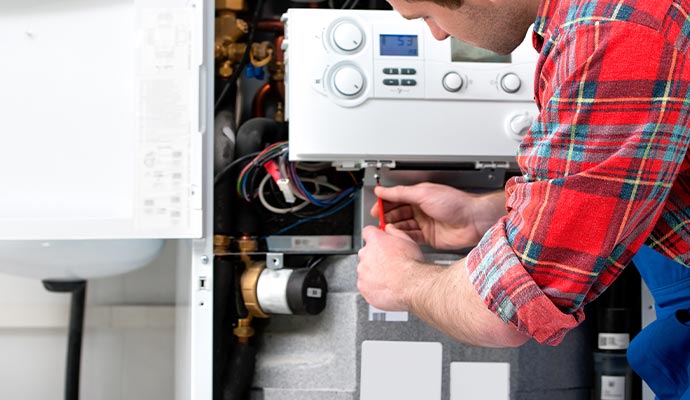 servicing heating boiler