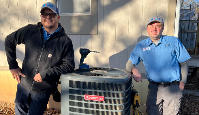 Two HVAC professionals